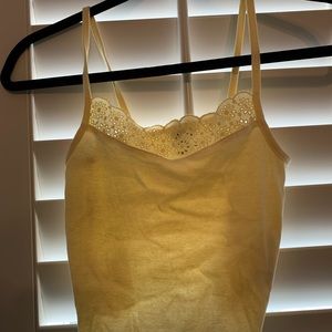 URBAN Light yellow crop tank with detail